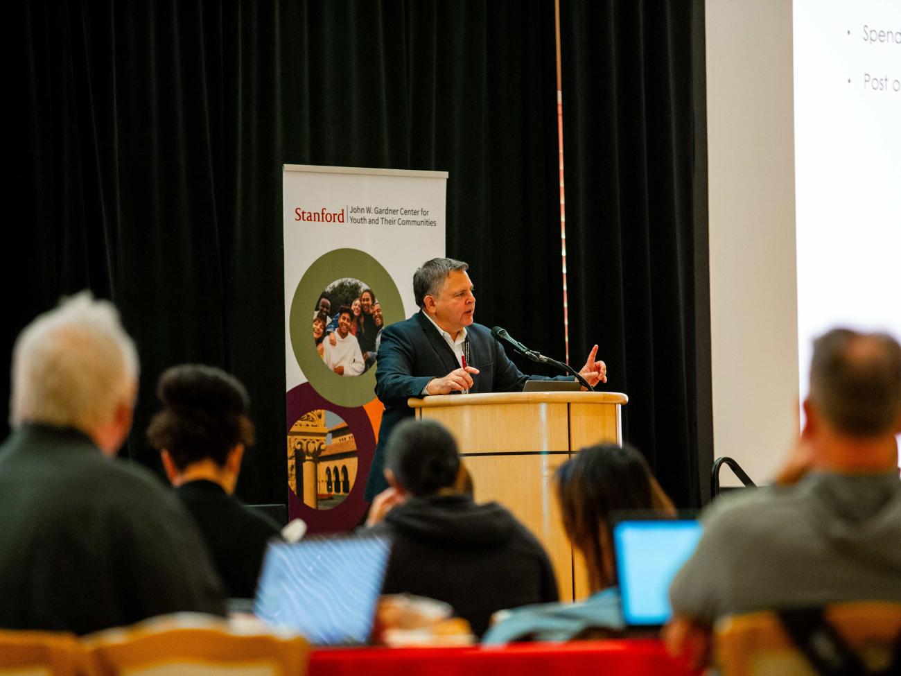 Deputy Director Jorge Ruiz de Velasco leads a conference of educators