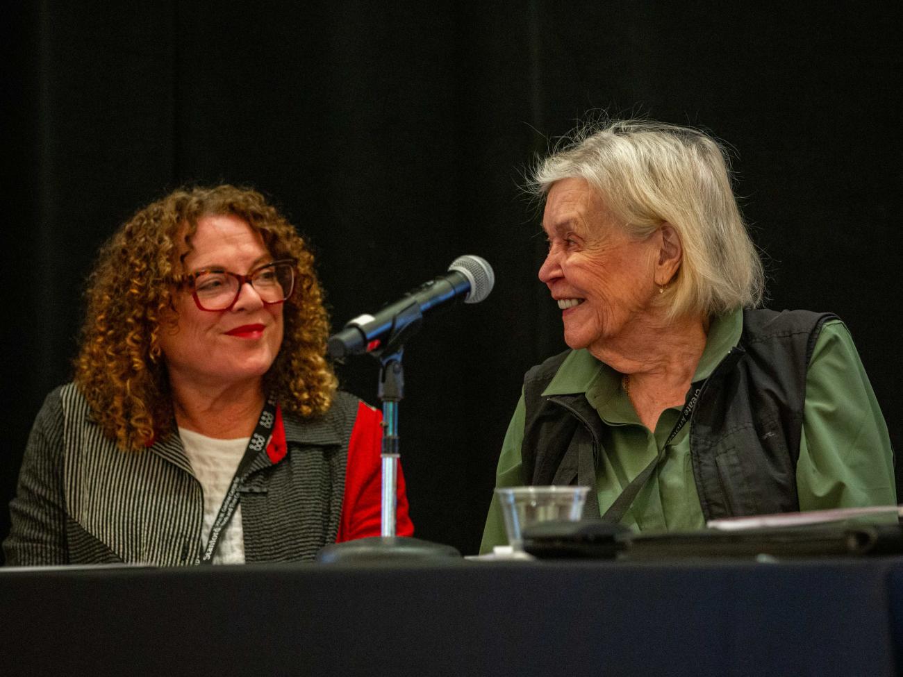 Milbrey McGlaughlin speaks on a panel during a conference