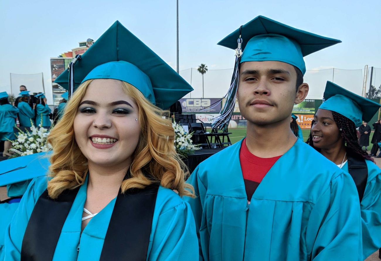 Students graduate from an alternative high school