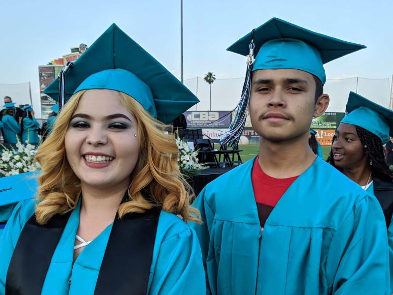 Students graduate from an alternative high school